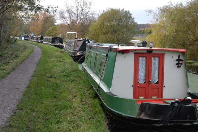 Just some of the vessels waiting to go through the Wigan flight of locks