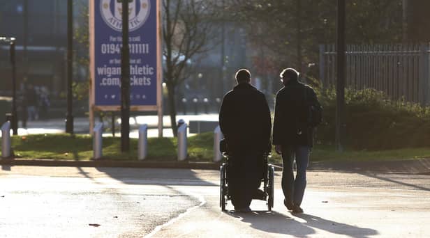 Fans outside Wigan Athletic's DW Stadium