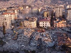 An aerial photo shows collapsed buildings in Antakya on February 11, 2023, after a 7.8-magnitude earthquake struck the country's southeast  (Photo by Hassan AYADI / AFP) (Photo by HASSAN AYADI/AFP via Getty Images)
