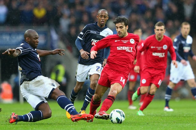 Danny Shittu of Millwall tackles Jordi Gomez