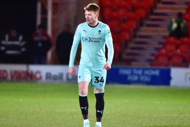 Luke Robinson has returned to Wigan after suffering a knee injury during his loan spell at St Johnstone