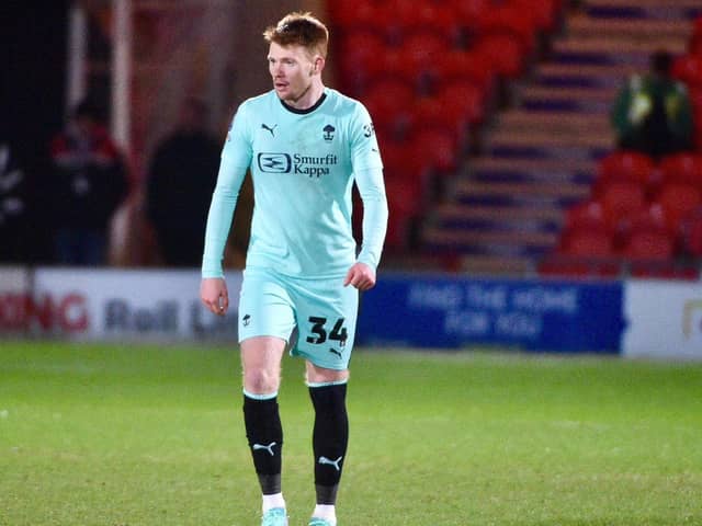 Luke Robinson has returned to Wigan after suffering a knee injury during his loan spell at St Johnstone