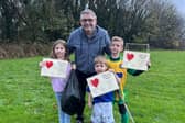 Coun Chris Ready with young litter pickers Holly Power, six, Lewis Power, three, and Isaac McCarren, eight