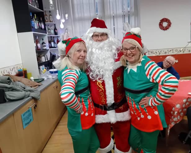 Julie pictured on the left with  Barbara Donnell and Wigan councillor Steve Dawber