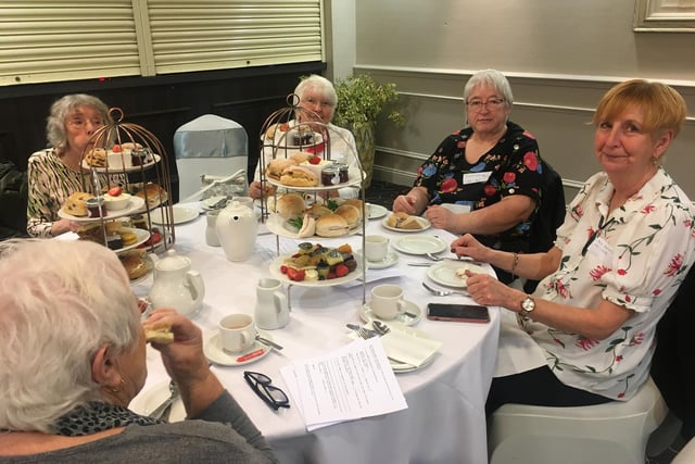 Wigan Girls’ High School Old Girls’ Association enjoy tea and sandwiches.