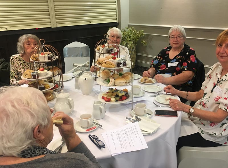 Wigan Girls’ High School Old Girls’ Association enjoy tea and sandwiches.
