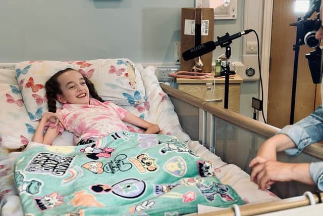 Leila, 12, who visits Derian House children's hospice, is filmed for The Little Things documentary