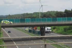 The crash scene on the M58 with screens erected around it