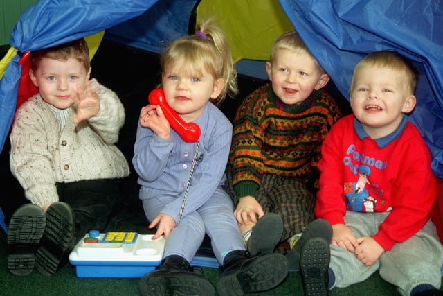Here's a picture of the then newly launched Little Gems nursery in Springfield which was offering two new slots for children.  Pictured, left to right: Declan Potter,  Lucy Wilton, Mark Powerll and Daniel Gilmore in a play tent
