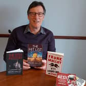 Frank Malley with his latest books including The Hit List
