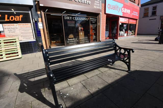 The bench on Market Street now with the plaque removed