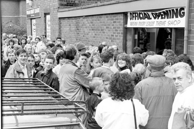 1990 - Large crowds queue for the opening of the Wigan Rugby League club theme shop