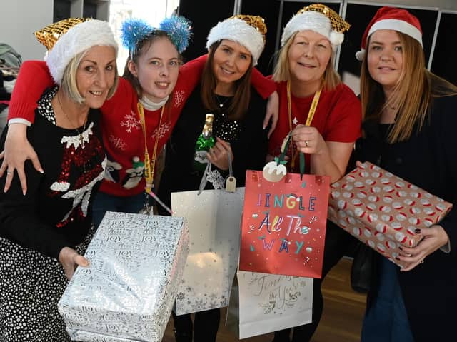Noreen Bond, Katie Wilkes, Joanne Bimson, Maureen Holcroft and Shelley Brady with gifts for a previous Daffodils Dreams' Christmas appeal