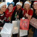 Noreen Bond, Katie Wilkes, Joanne Bimson, Maureen Holcroft and Shelley Brady with gifts for a previous Daffodils Dreams' Christmas appeal