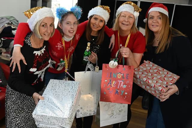 Noreen Bond, Katie Wilkes, Joanne Bimson, Maureen Holcroft and Shelley Brady with gifts for a previous Daffodils Dreams' Christmas appeal