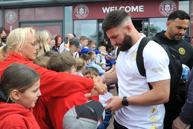 Fans met players before they got on the coach to Wembley.