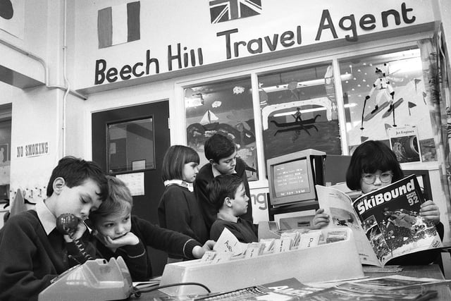 Pupils set up their own travel agency at Beech Hill Primary School on Tuesday 10th of March 1992.