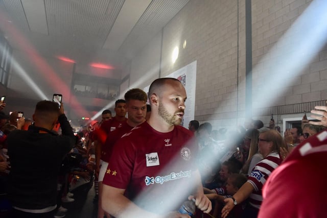 The fan zone was full of atmosphere as the squad walked through.