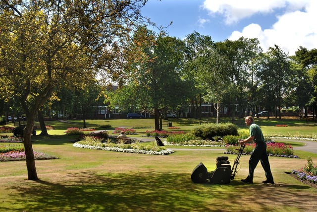 A gardener keeps Jubilee Park in tip-top condition