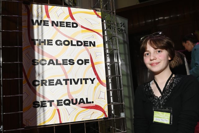 Emily Chambers, 14, created this poster on display at the event.