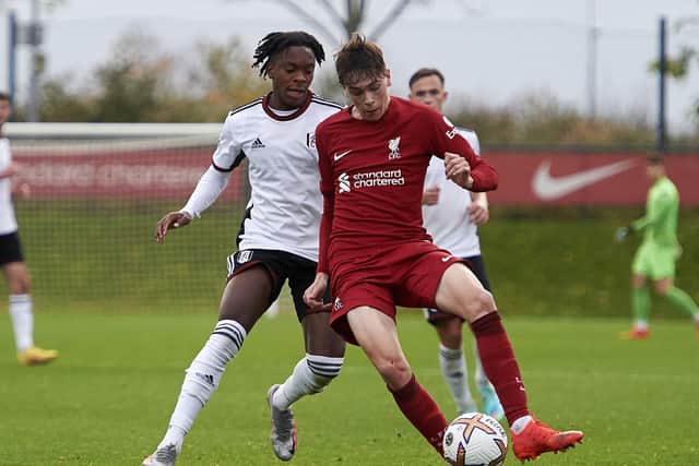 Luke Chambers goes up against new Latics team-mate Martial Godo during a recent clash of their parent clubs, Liverpool and Fulham respectively