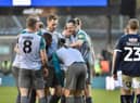 Will Keane takes the congratulations after opening the scoring at Millwall