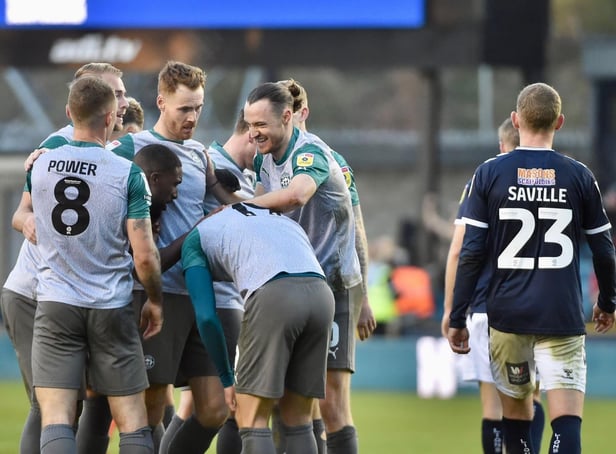 Will Keane takes the congratulations after opening the scoring at Millwall