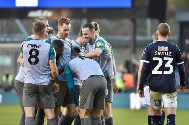 Will Keane takes the congratulations after opening the scoring at Millwall