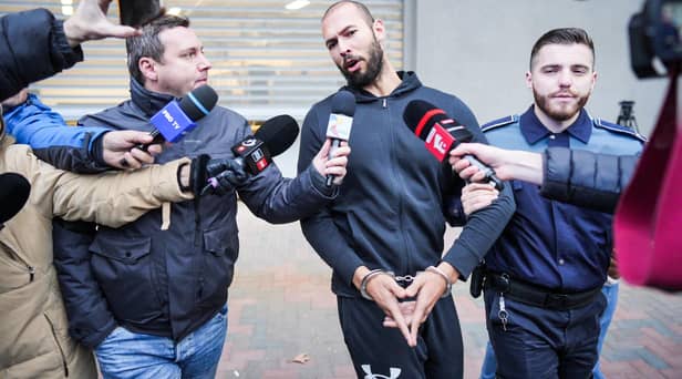 According to one poll, more than a quarter of young men have a favourable opinion of social media misogynist Andrew Tate, currently under house arrest in Romania amid an investigation into human trafficking (Picture: Mihai Barbu/AFP via Getty Images)