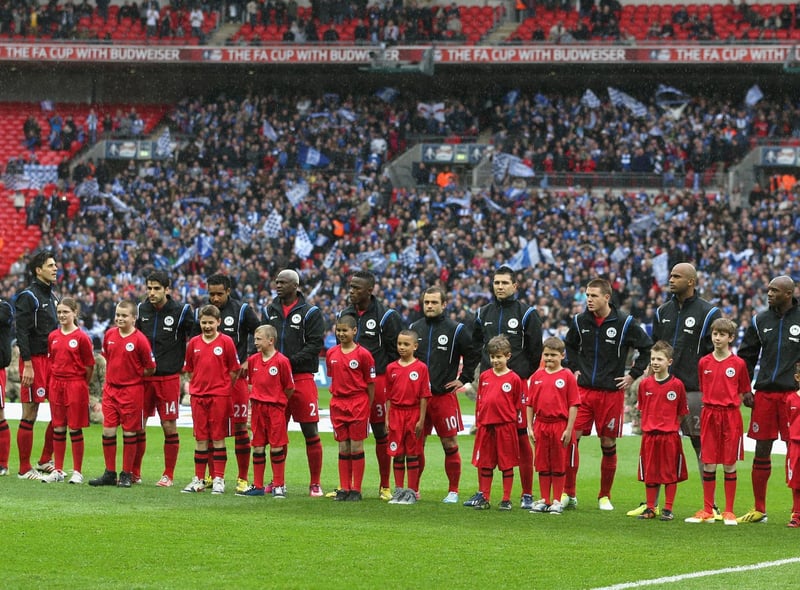The Wigan Athletic team line up ahead of the FA Cup with Budweiser Semi Final match between Millwall and Wigan Athletic at Wembley Stadium on April 13, 2013 in London, England.