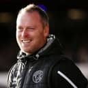 Former Wigan Athletic midfielder Michael Flynn is set to be named new Cheltenham Town manager, according to reports
