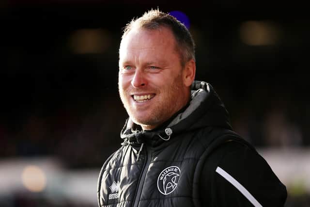 Former Wigan Athletic midfielder Michael Flynn is set to be named new Cheltenham Town manager, according to reports