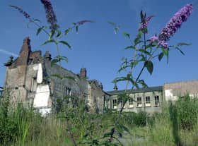 Wild flowers taking over at the Old Town Hall site in the centre of Wigan in 2002.
