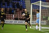 Will Keane celebrates after equalising for Latics