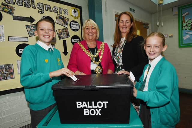 The Mayor of Wigan Coun Marie Morgan with headteacher Joanne Farrimond with head boy, Kian Walsh, left, and head girl Amelia Sharples, right.