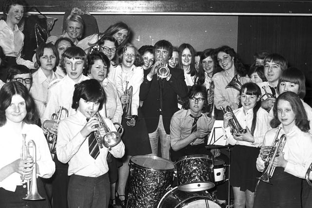 Retro 1975 - Musician, dancer, singer, comedian, actor, and television presenter, Roy Castle in the centre of this picture at Wigan annual school music festival 1975.