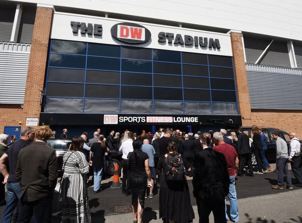 Hundreds of people gathered outside the DW Stadium for the funeral of Wigan rugby league legend Bill Ashurst
