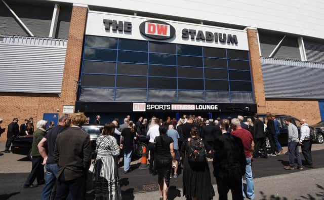 Hundreds of people gathered outside the DW Stadium for the funeral of Wigan rugby league legend Bill Ashurst