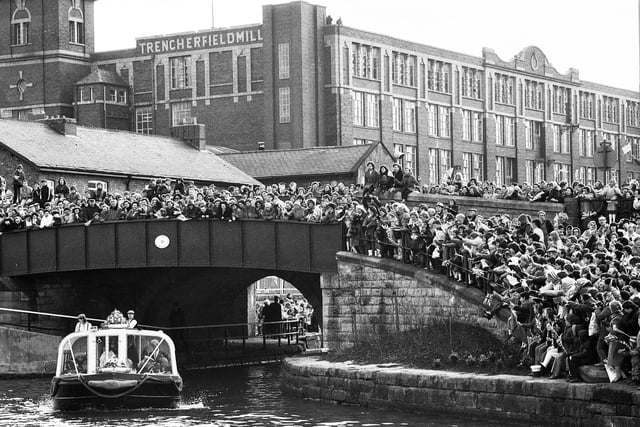 The royal party arrives at the Heritage Centre aboard the waterbus Emma to cheers from the crowds lining the canal banks, 1986.