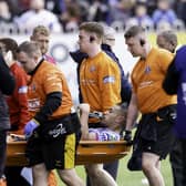Wigan's Willie Isa was stretchered off after an injury at the Mend-A-Hose Jungle