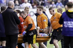 Wigan's Willie Isa was stretchered off after an injury at the Mend-A-Hose Jungle