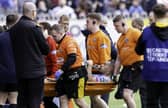 Wigan's Willie Isa was stretchered off after an injury at the Mend-A-Hose Jungle