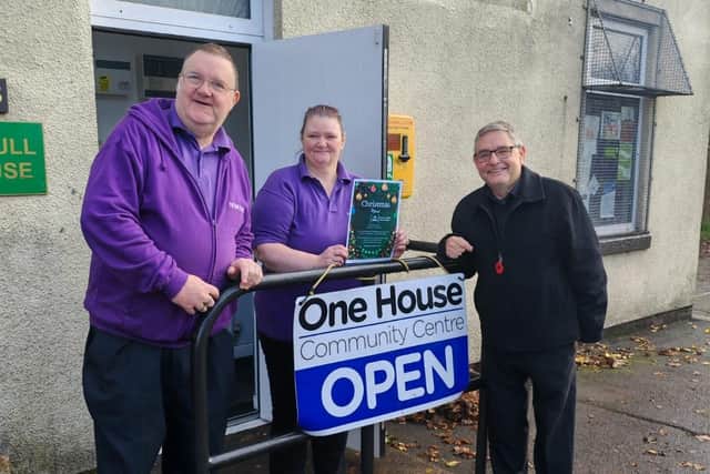 Coun Chris Ready, right, at The One House with Nigel and Andrea Dean