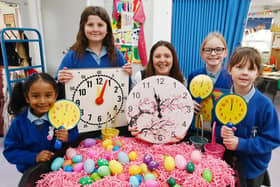 Assistant headteacher Mrs Blackledge with pupils who have been learning how to tell the time at St Thomas's CE Primary School, Ashton