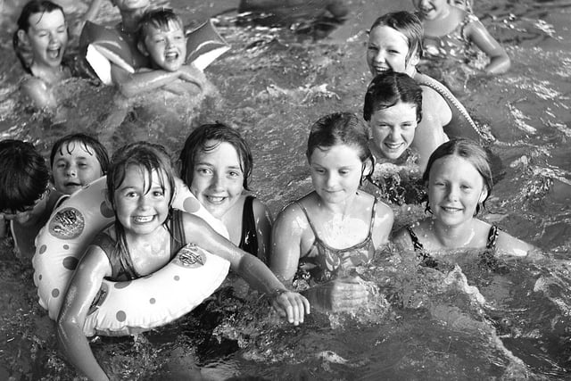 RETRO 1976 Cooling off at Hindley pool during the  long hot summer of '76 .