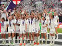 England's Ellen White and Jill Scott lift the trophy as England celebrate winning the UEFA Women's Euro 2022 final at Wembley Stadium, London. Picture date: Sunday July 31, 2022.