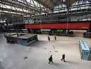 Police Office and National Rail Staff are seen at an empty Waterloo Station in London (Photo: Alex Davidson/Getty Images)