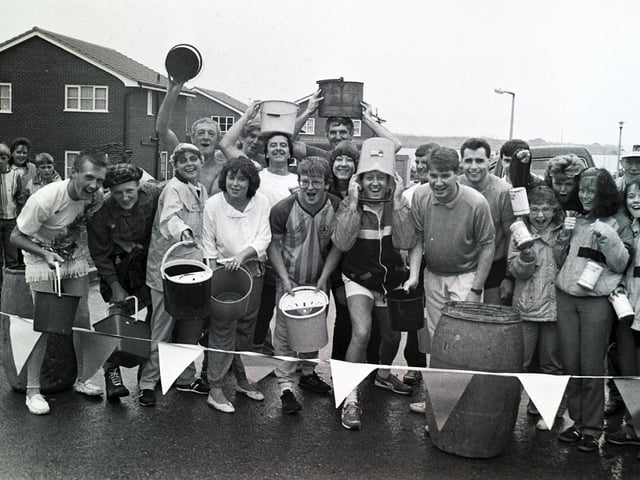 A fund-raising event by regulars of The Tippings Arms pub in Poolstock in 1986. The start of the bucket race.
