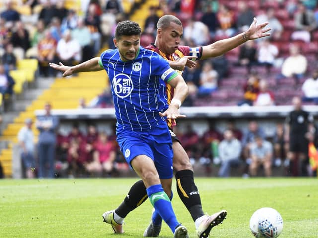 James Vaughan - seen in action for Bradford against Latics - has been promoted at Everton