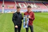 Bradd and Lucas Parfitt pictured at the DW Stadium, home of Latics.
